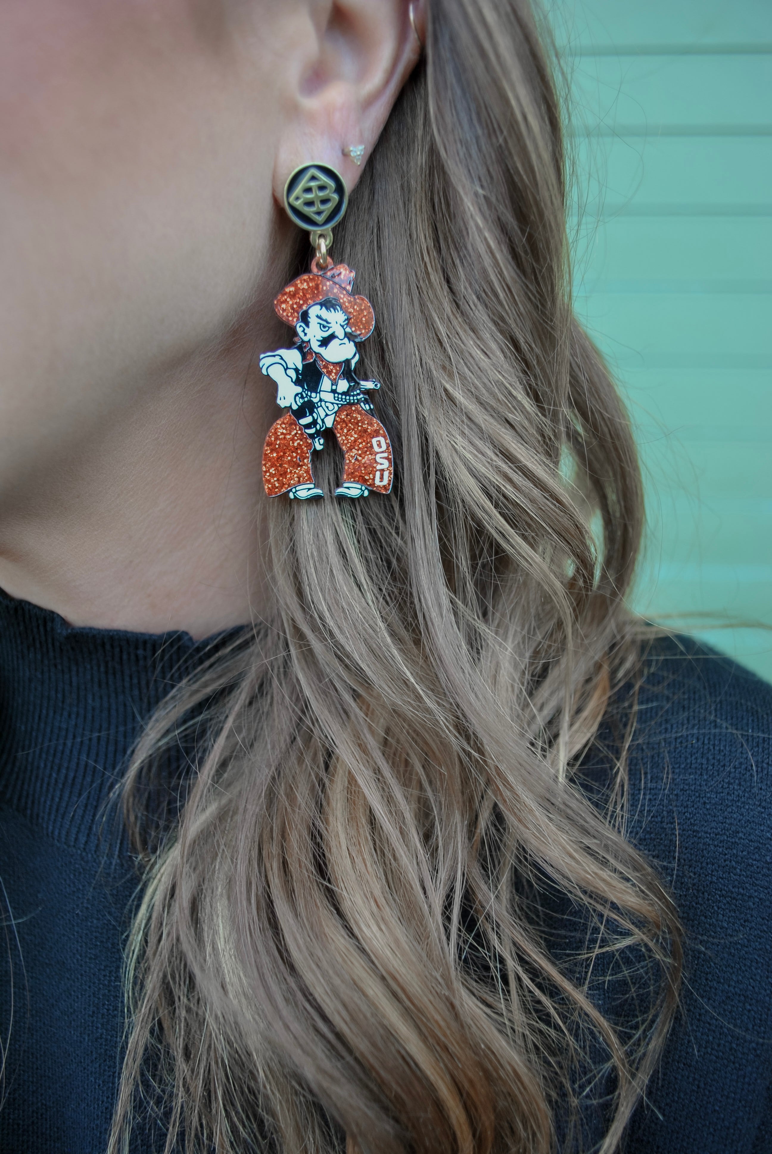 Brianna Cannon: Orange Glitter Pistol Pete Earrings