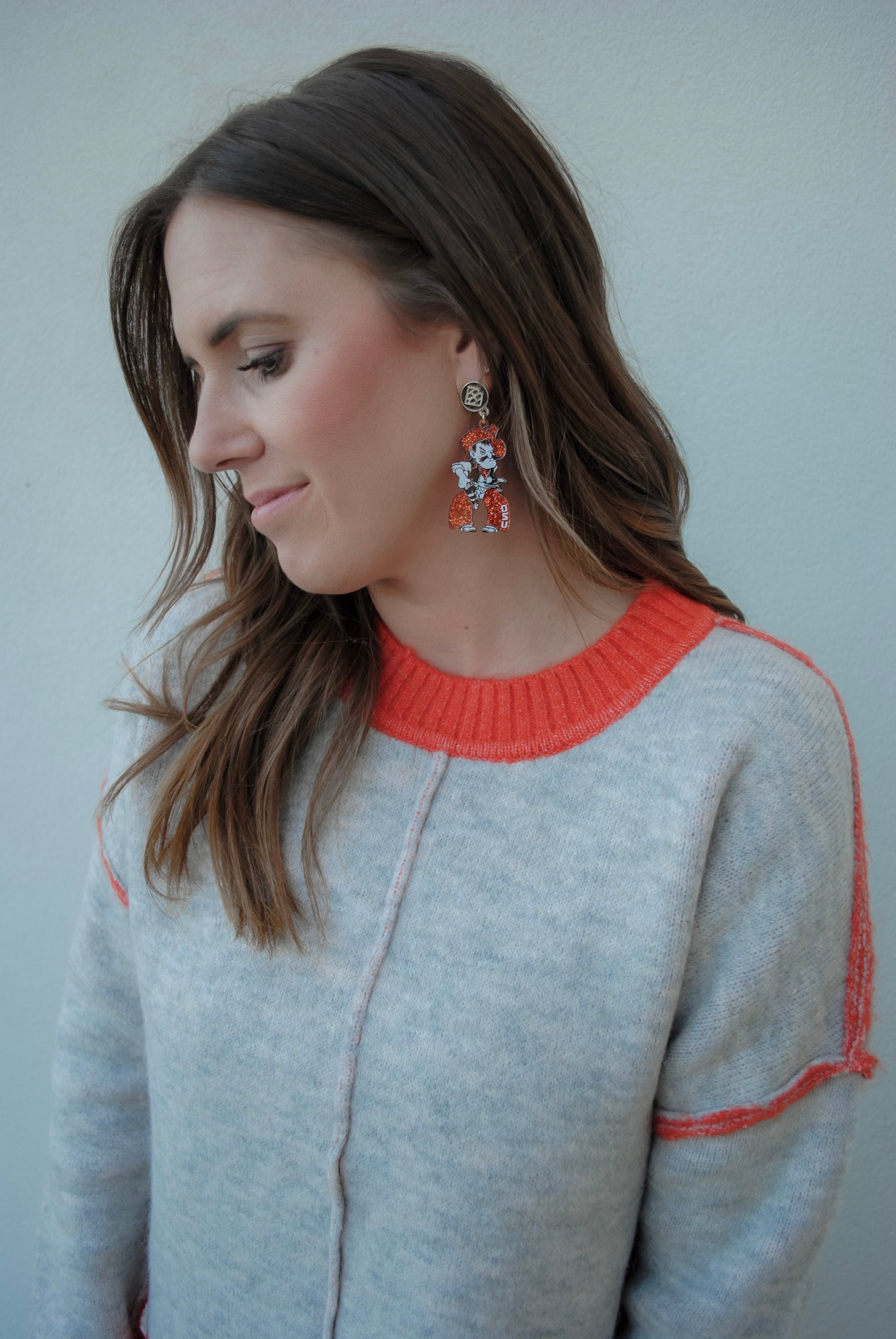 Brianna Cannon: Orange Glitter Pistol Pete Earrings
